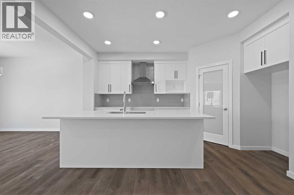 11 Heritage Link, Cochrane, Alberta  T4C 2J8 - Photo 12 - A2248171