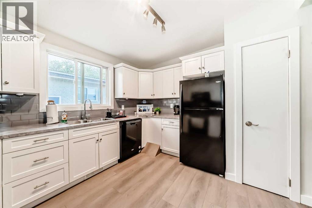 516 72 Avenue Nw, Calgary, Alberta  T2K 0P2 - Photo 11 - A2262717