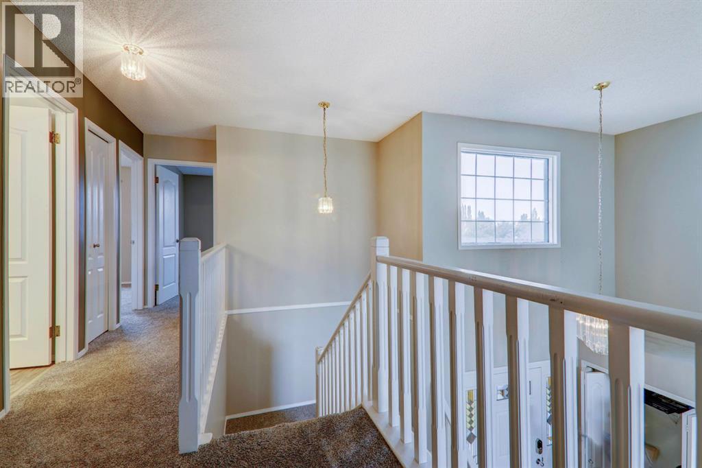 435 Douglas Ridge Mews Se, Calgary, Alberta  T2Z 2M4 - Photo 19 - A2262784