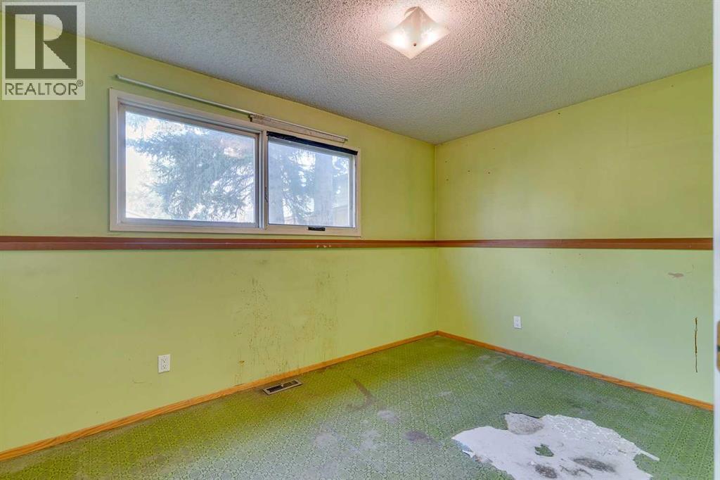 1204 Lake Sylvan Drive Se, Calgary, Alberta  T2J 3C8 - Photo 10 - A2262647