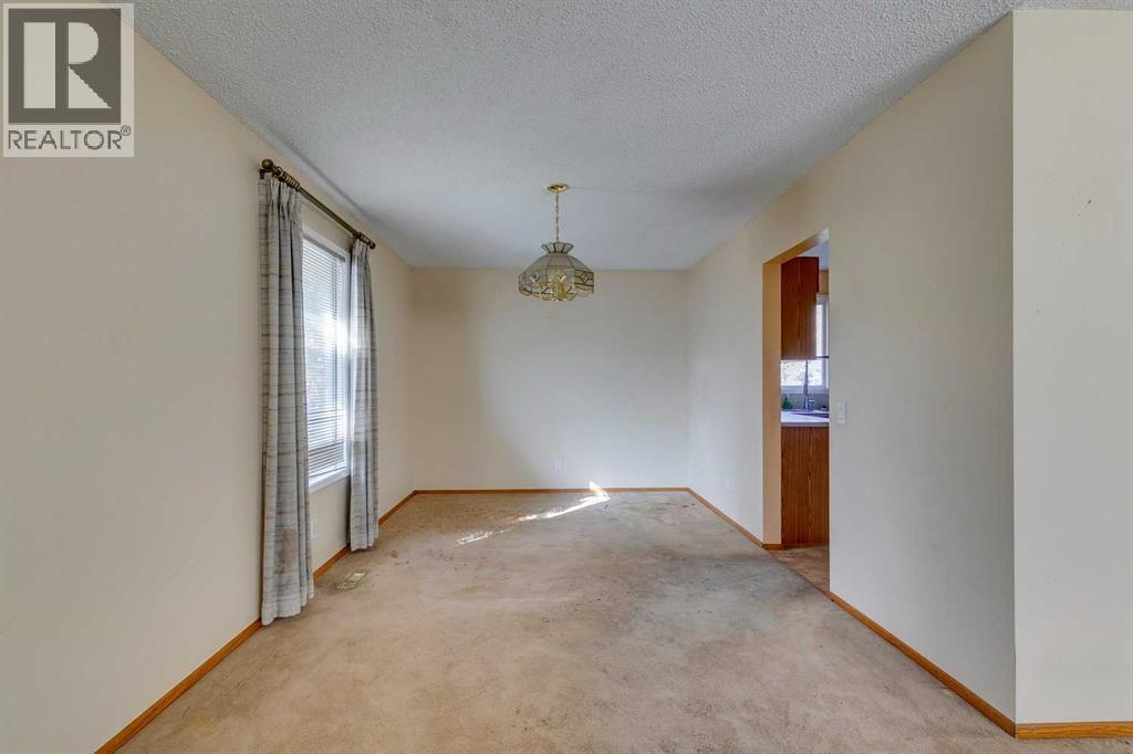 1204 Lake Sylvan Drive Se, Calgary, Alberta  T2J 3C8 - Photo 4 - A2262647