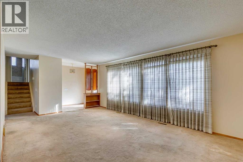 1204 Lake Sylvan Drive Se, Calgary, Alberta  T2J 3C8 - Photo 2 - A2262647