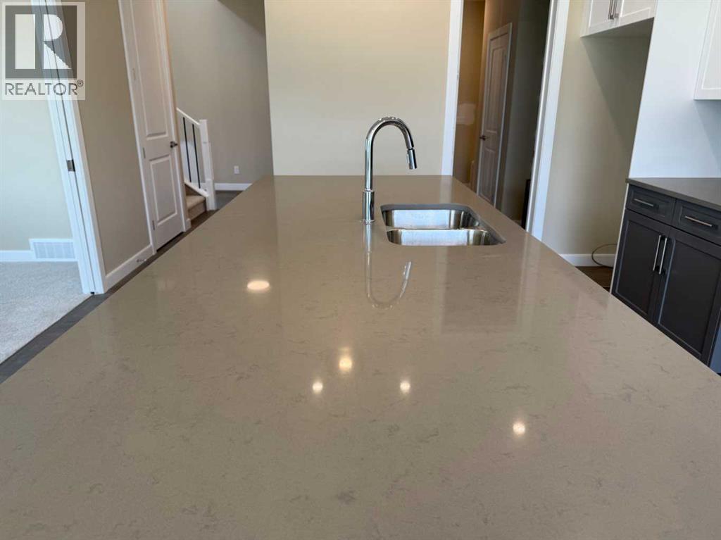 91 Sundown Crescent, Cochrane, Alberta  T4C 1Y3 - Photo 10 - A2228402