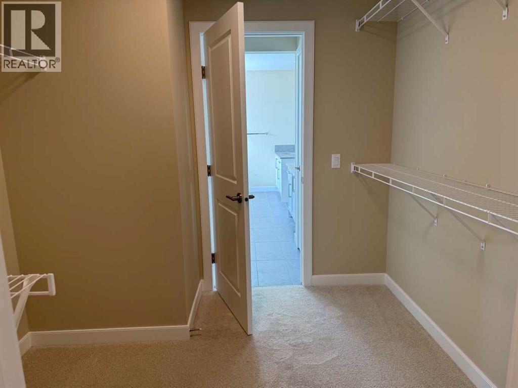 91 Sundown Crescent, Cochrane, Alberta  T4C 1Y3 - Photo 32 - A2228402