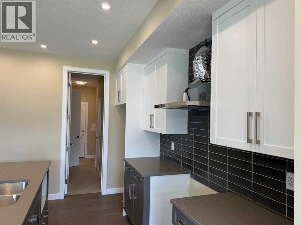 91 Sundown Crescent, Cochrane, Alberta  T4C 1Y3 - Photo 12 - A2228402