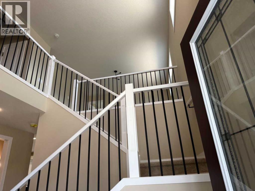 91 Sundown Crescent, Cochrane, Alberta  T4C 1Y3 - Photo 2 - A2228402