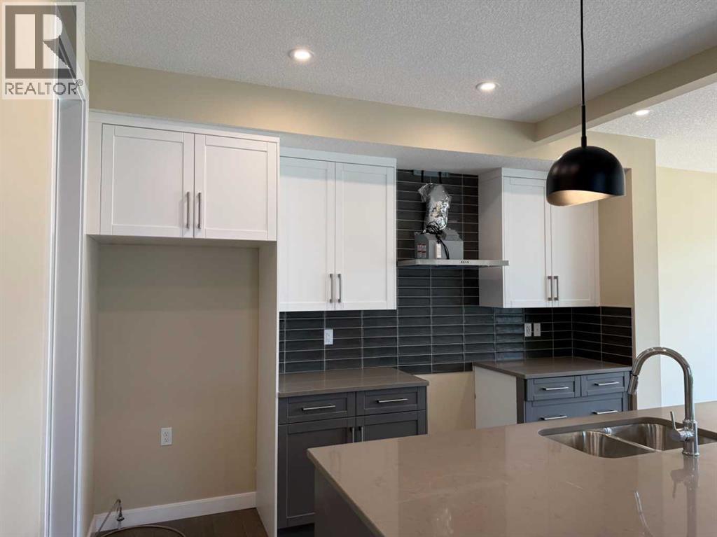 91 Sundown Crescent, Cochrane, Alberta  T4C 1Y3 - Photo 7 - A2228402