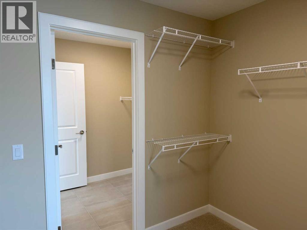 91 Sundown Crescent, Cochrane, Alberta  T4C 1Y3 - Photo 33 - A2228402