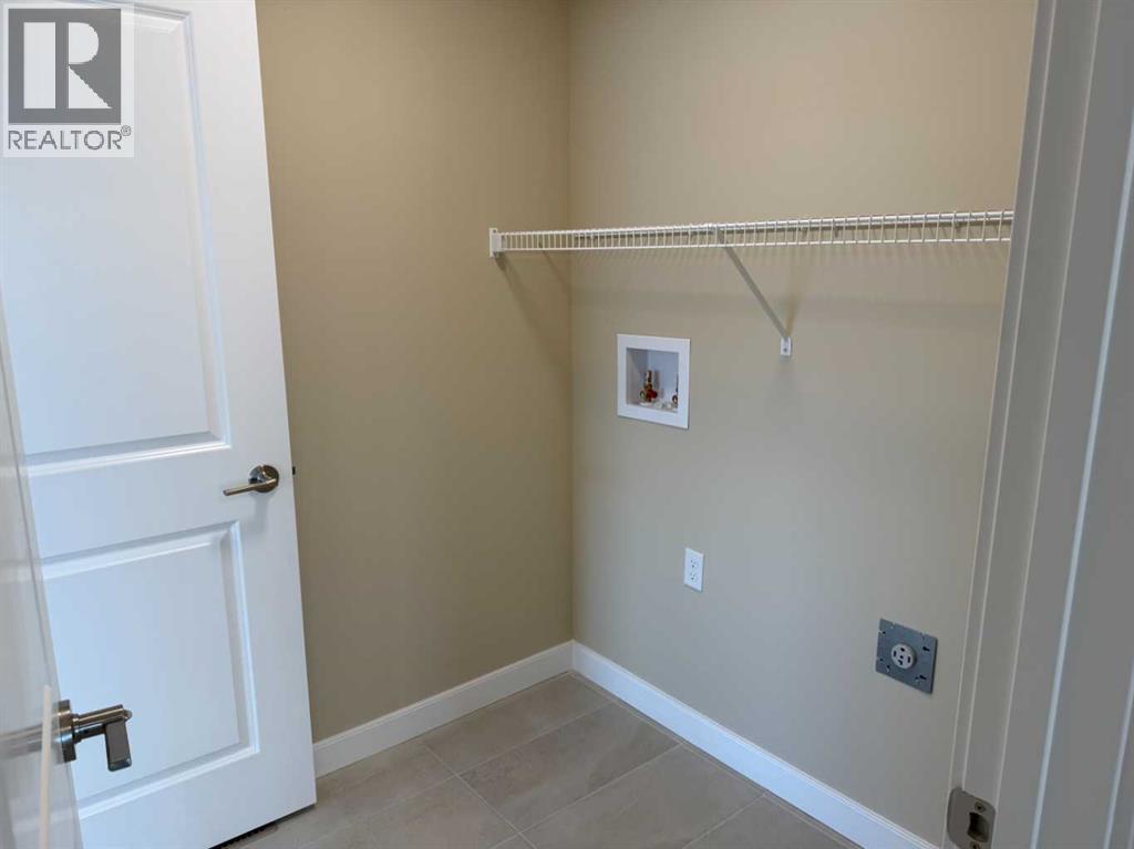 91 Sundown Crescent, Cochrane, Alberta  T4C 1Y3 - Photo 34 - A2228402