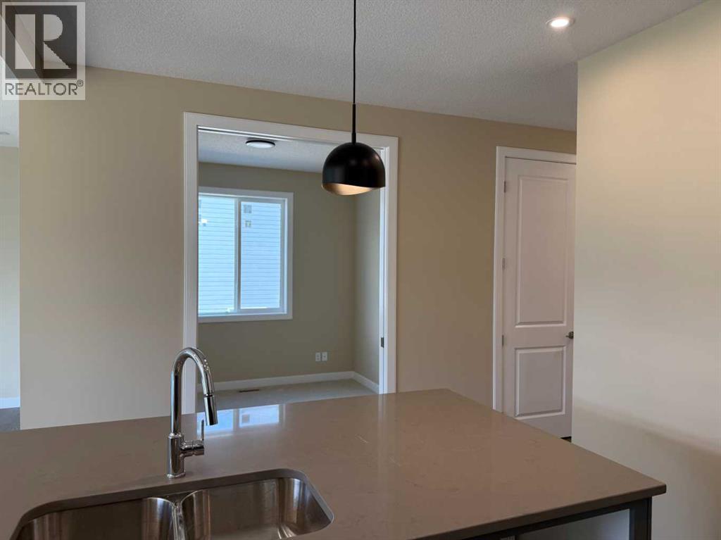 91 Sundown Crescent, Cochrane, Alberta  T4C 1Y3 - Photo 14 - A2228402