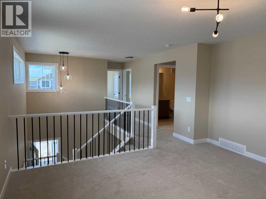 91 Sundown Crescent, Cochrane, Alberta  T4C 1Y3 - Photo 43 - A2228402