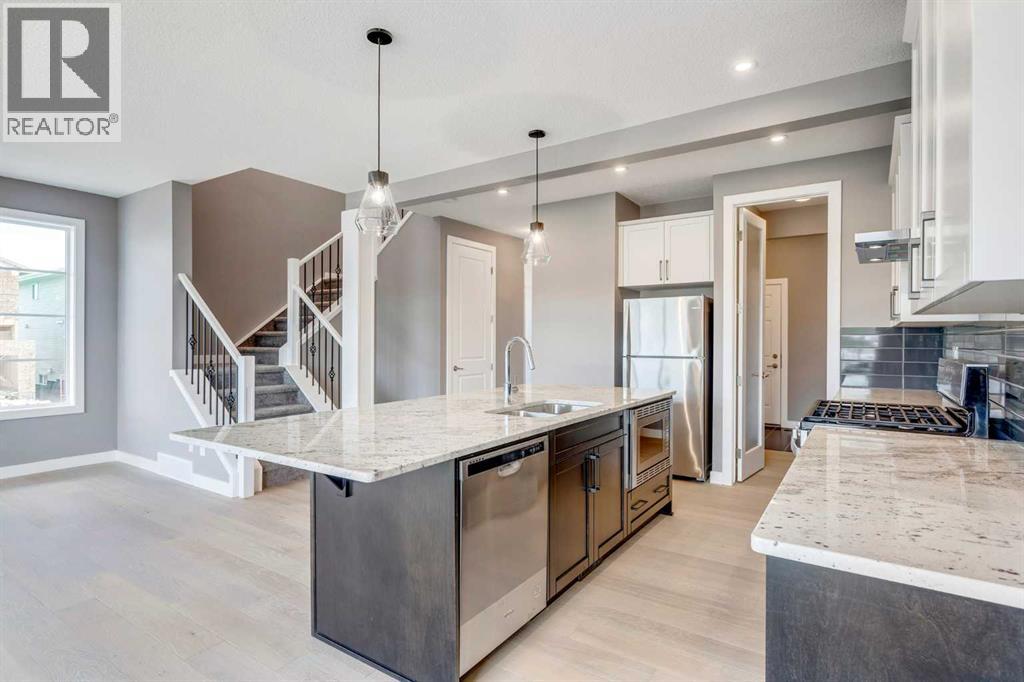 92 Sundown Crescent, Cochrane, Alberta  T4C 1Y3 - Photo 6 - A2228997