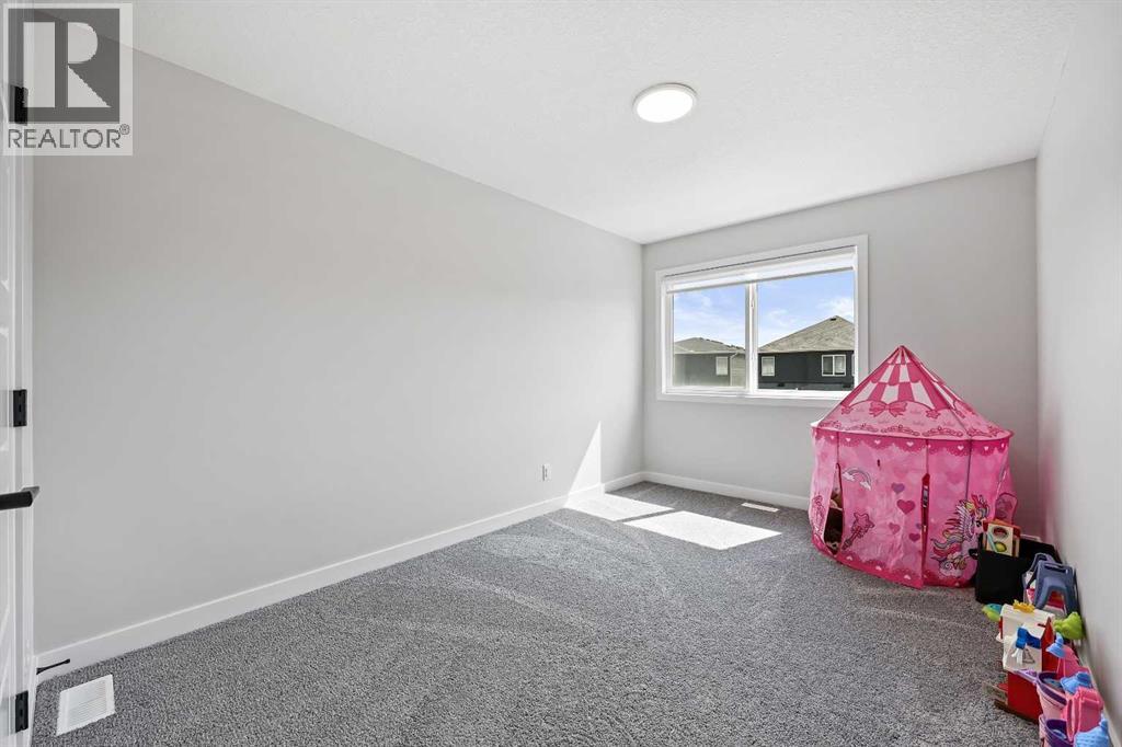 83 Wolf Creek Rise Se, Calgary, Alberta  T2X 4Z2 - Photo 34 - A2247575