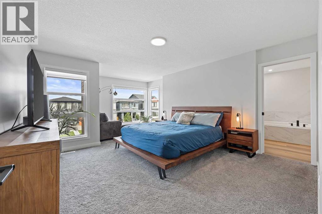 83 Wolf Creek Rise Se, Calgary, Alberta  T2X 4Z2 - Photo 24 - A2247575