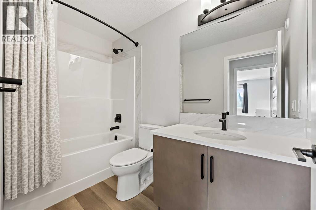 83 Wolf Creek Rise Se, Calgary, Alberta  T2X 4Z2 - Photo 33 - A2247575