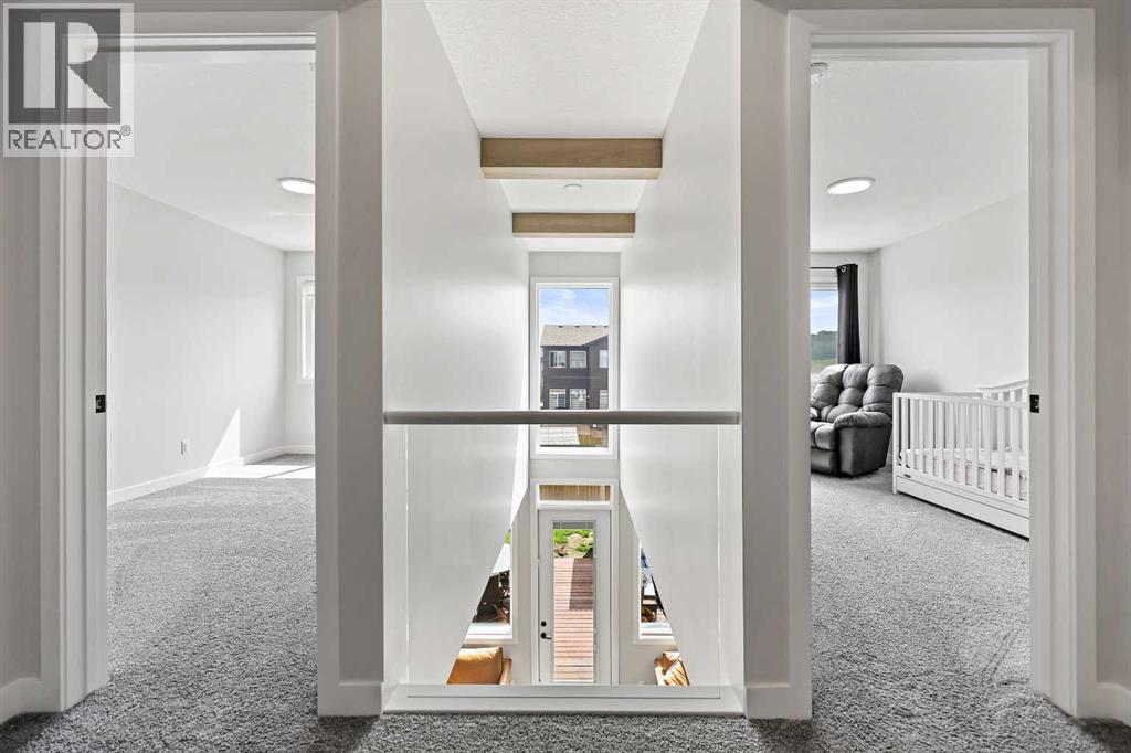 83 Wolf Creek Rise Se, Calgary, Alberta  T2X 4Z2 - Photo 30 - A2247575