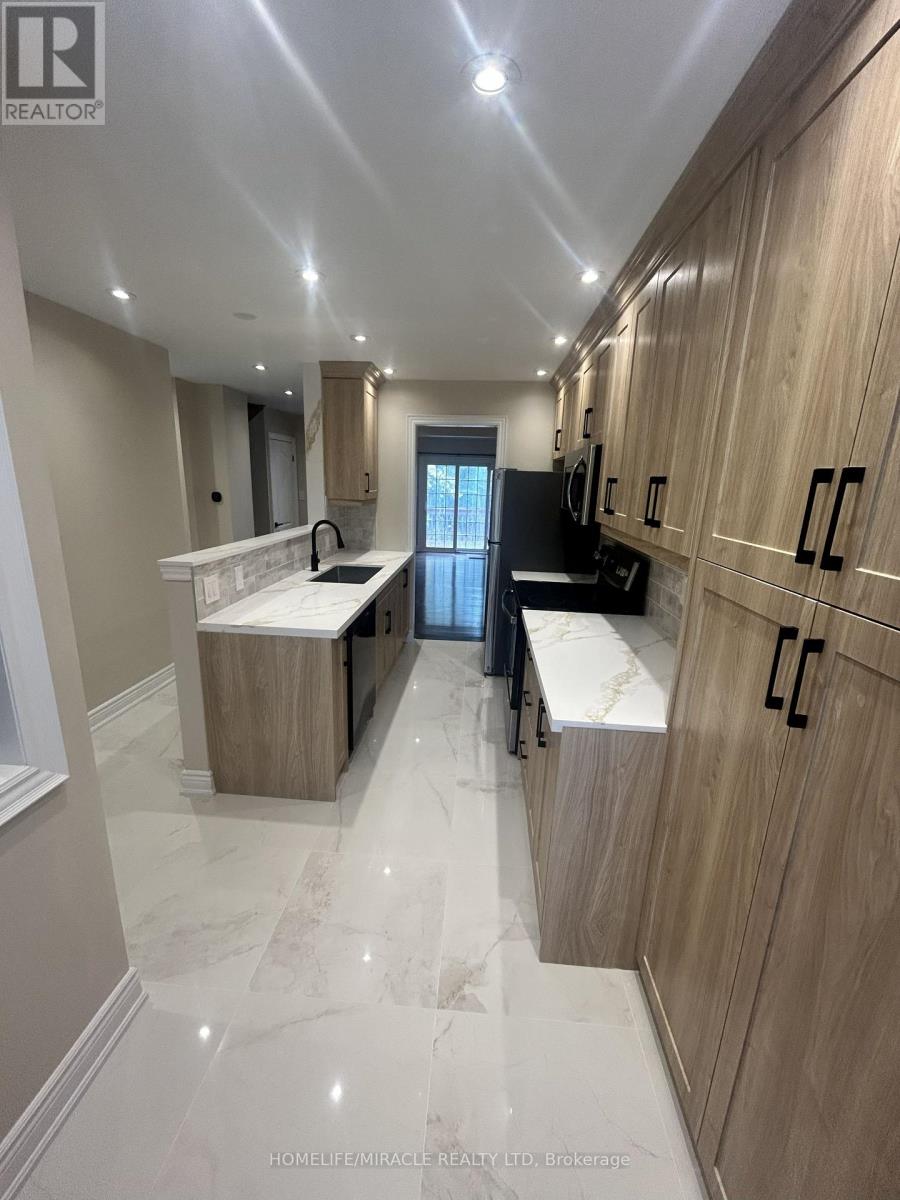 49 Ristau Crescent, Kitchener, Ontario  N2E 3A8 - Photo 3 - X12484721