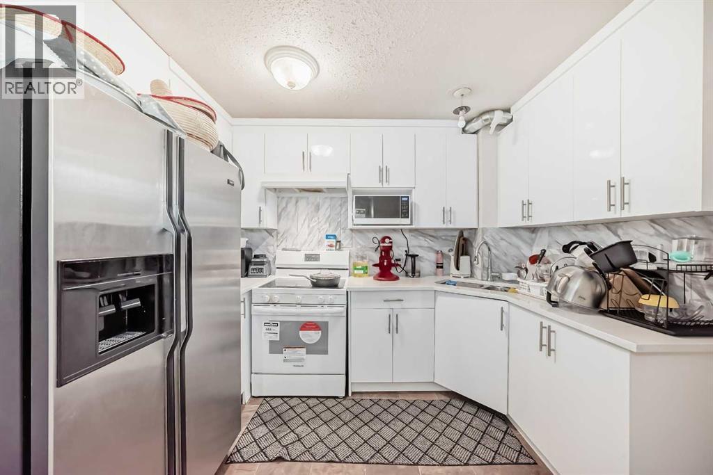 11 Falsby Way Ne, Calgary, Alberta  T3J 3A2 - Photo 5 - A2266852