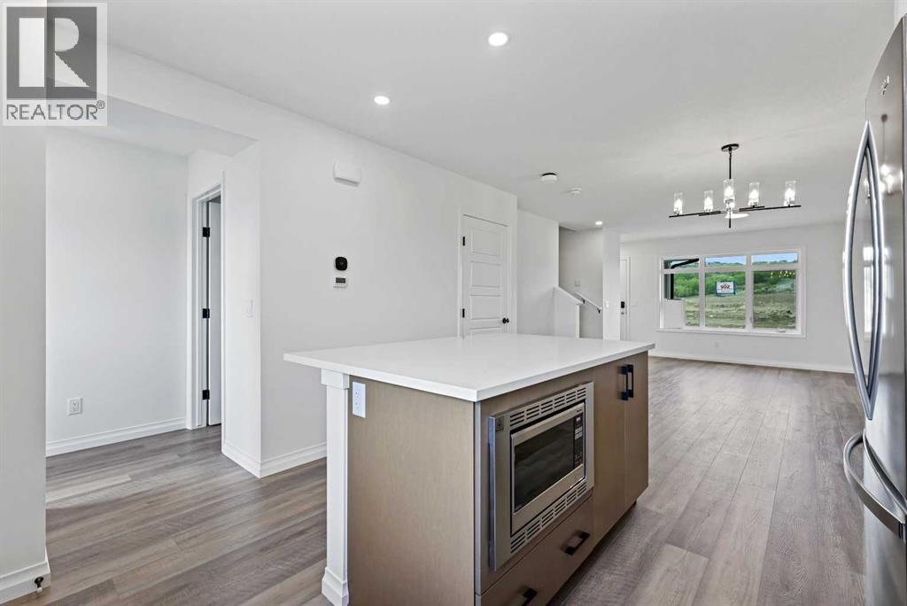 Property at 902 Wolf Willow Boulevard SE image 4