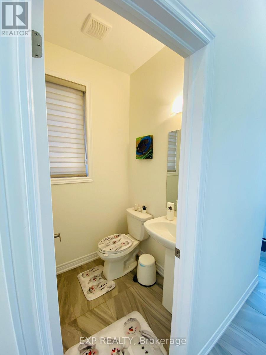 1394 Farmstead Drive, Milton, Ontario  L9E 1K4 - Photo 6 - W12484878