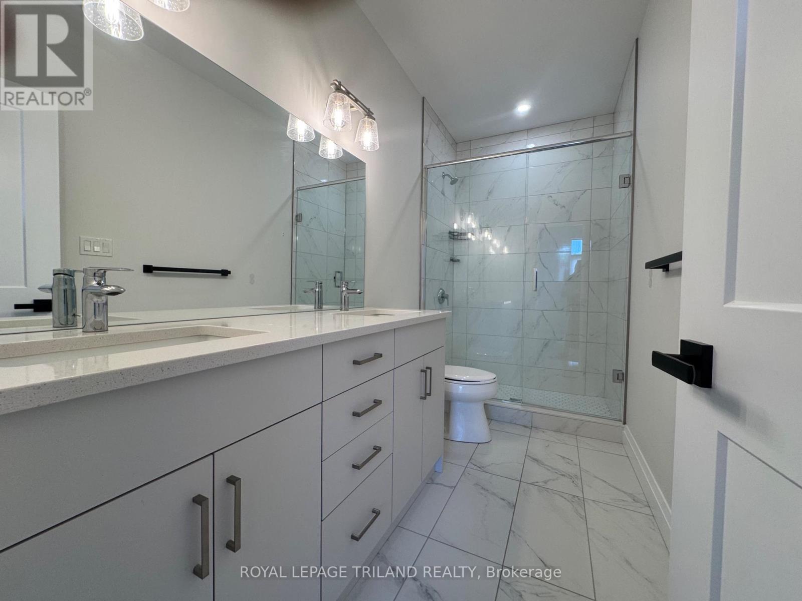 49 - 63 Compass Trail, Central Elgin, Ontario  N5L 0B4 - Photo 14 - X12458861