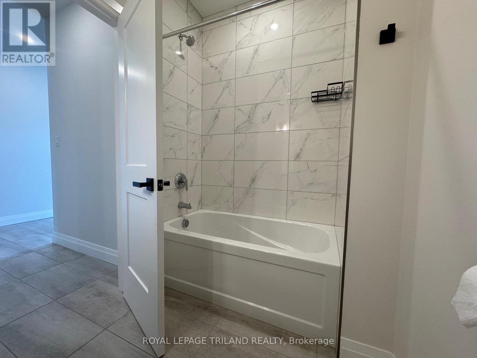 49 - 63 Compass Trail, Central Elgin, Ontario  N5L 0B4 - Photo 6 - X12458861