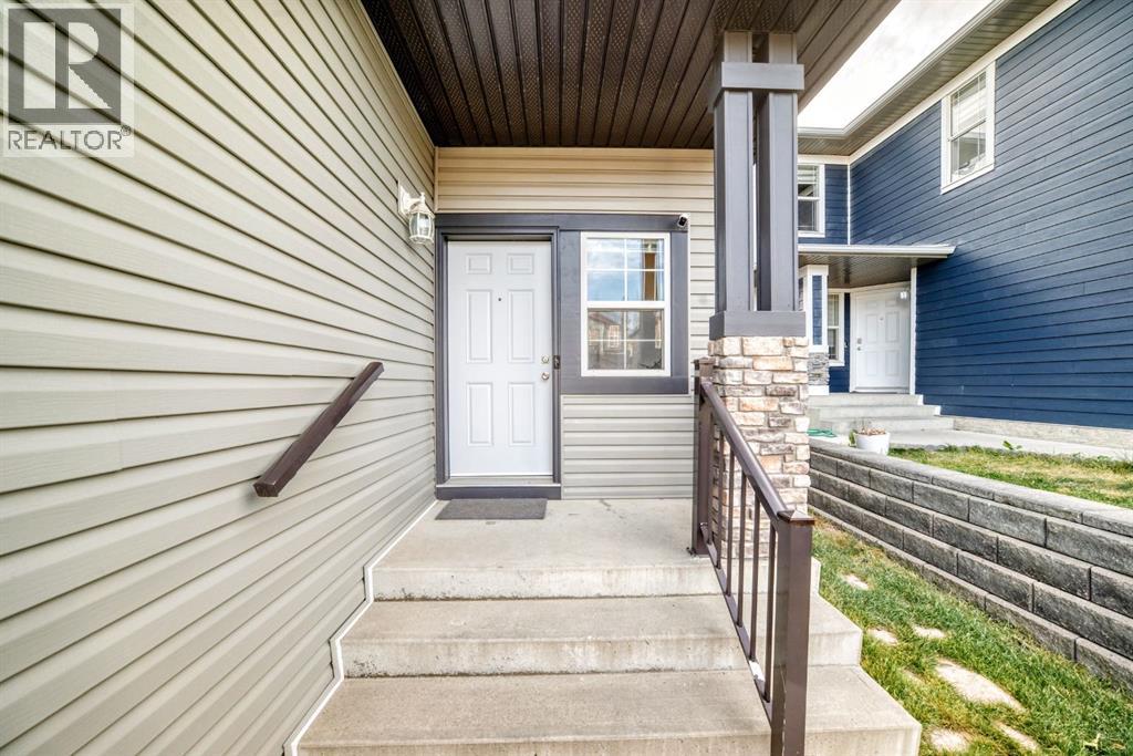 58 Panatella Lane Nw, Calgary, Alberta  T3K 6C5 - Photo 3 - A2267326