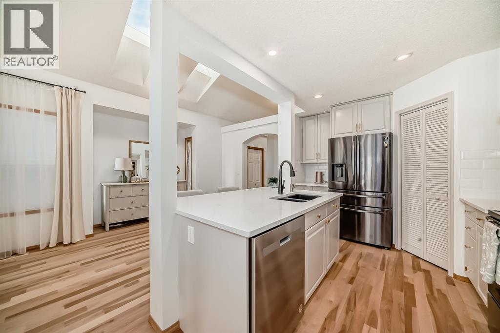 58 Panatella Lane Nw, Calgary, Alberta  T3K 6C5 - Photo 5 - A2267326