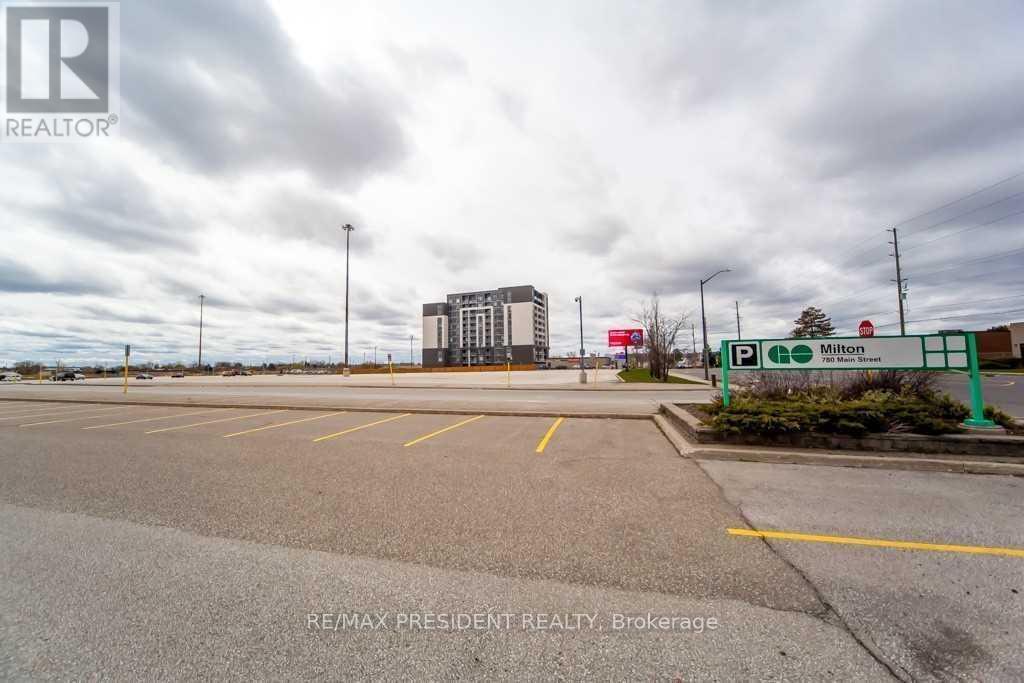 303 - 716 Main Street E, Milton, Ontario  L9T 9L9 - Photo 2 - W12484950