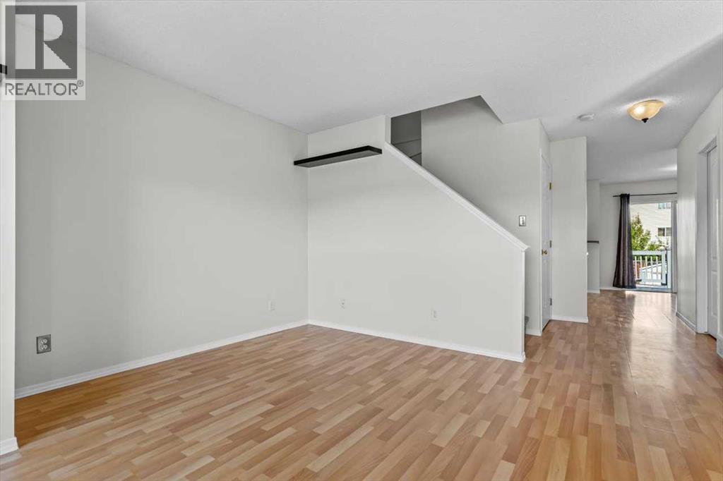 911 Arbour Lake Road Nw, Calgary, Alberta  T3G 4Z9 - Photo 4 - A2266005