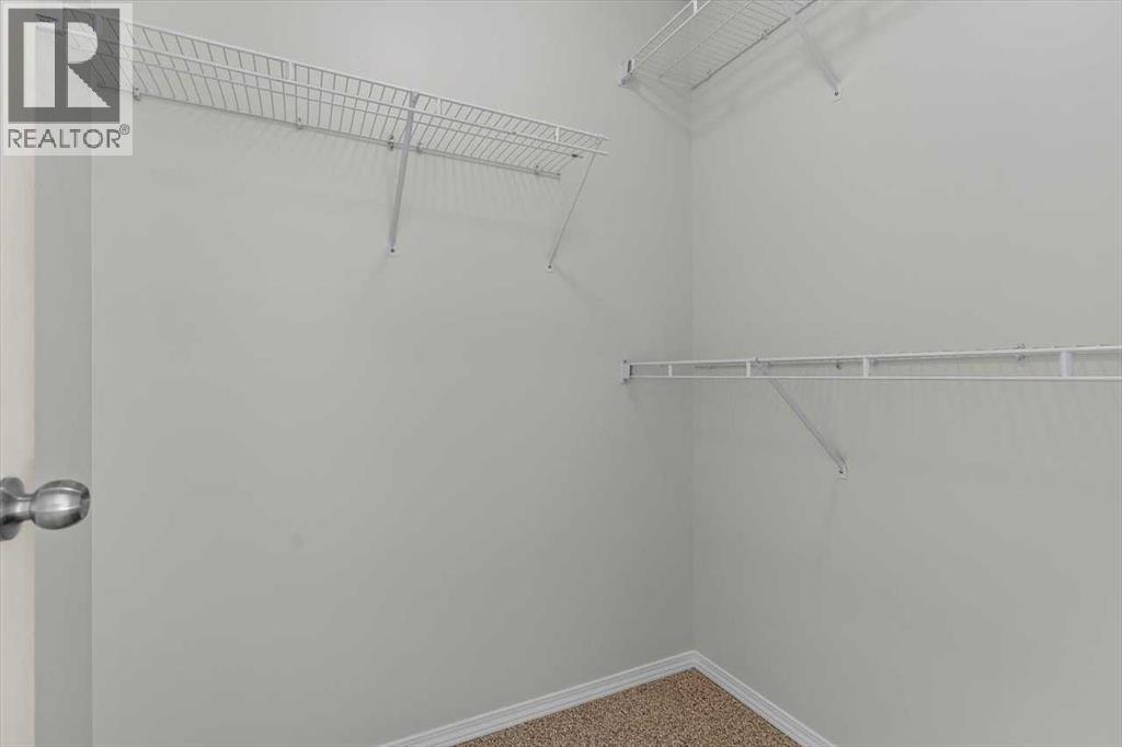 911 Arbour Lake Road Nw, Calgary, Alberta  T3G 4Z9 - Photo 18 - A2266005