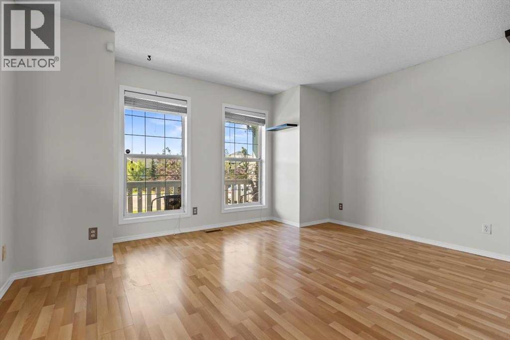 911 Arbour Lake Road Nw, Calgary, Alberta  T3G 4Z9 - Photo 6 - A2266005