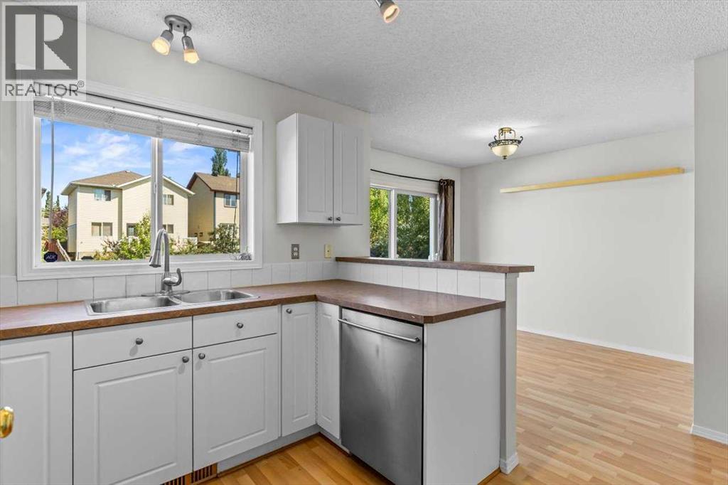 911 Arbour Lake Road Nw, Calgary, Alberta  T3G 4Z9 - Photo 9 - A2266005