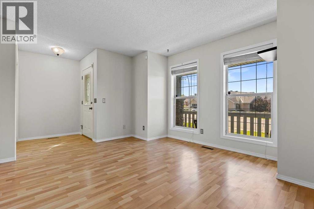 911 Arbour Lake Road Nw, Calgary, Alberta  T3G 4Z9 - Photo 5 - A2266005