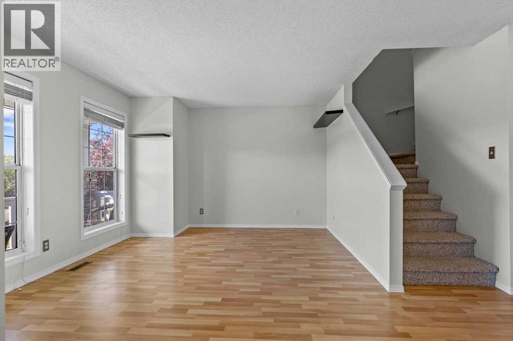 911 Arbour Lake Road Nw, Calgary, Alberta  T3G 4Z9 - Photo 3 - A2266005