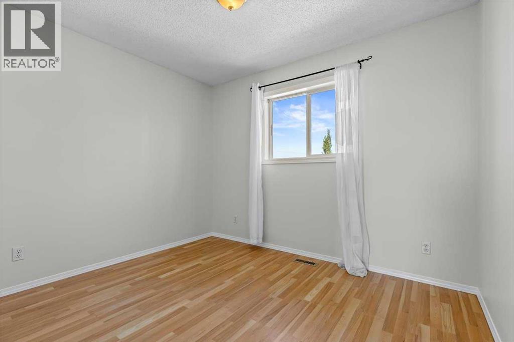 911 Arbour Lake Road Nw, Calgary, Alberta  T3G 4Z9 - Photo 22 - A2266005