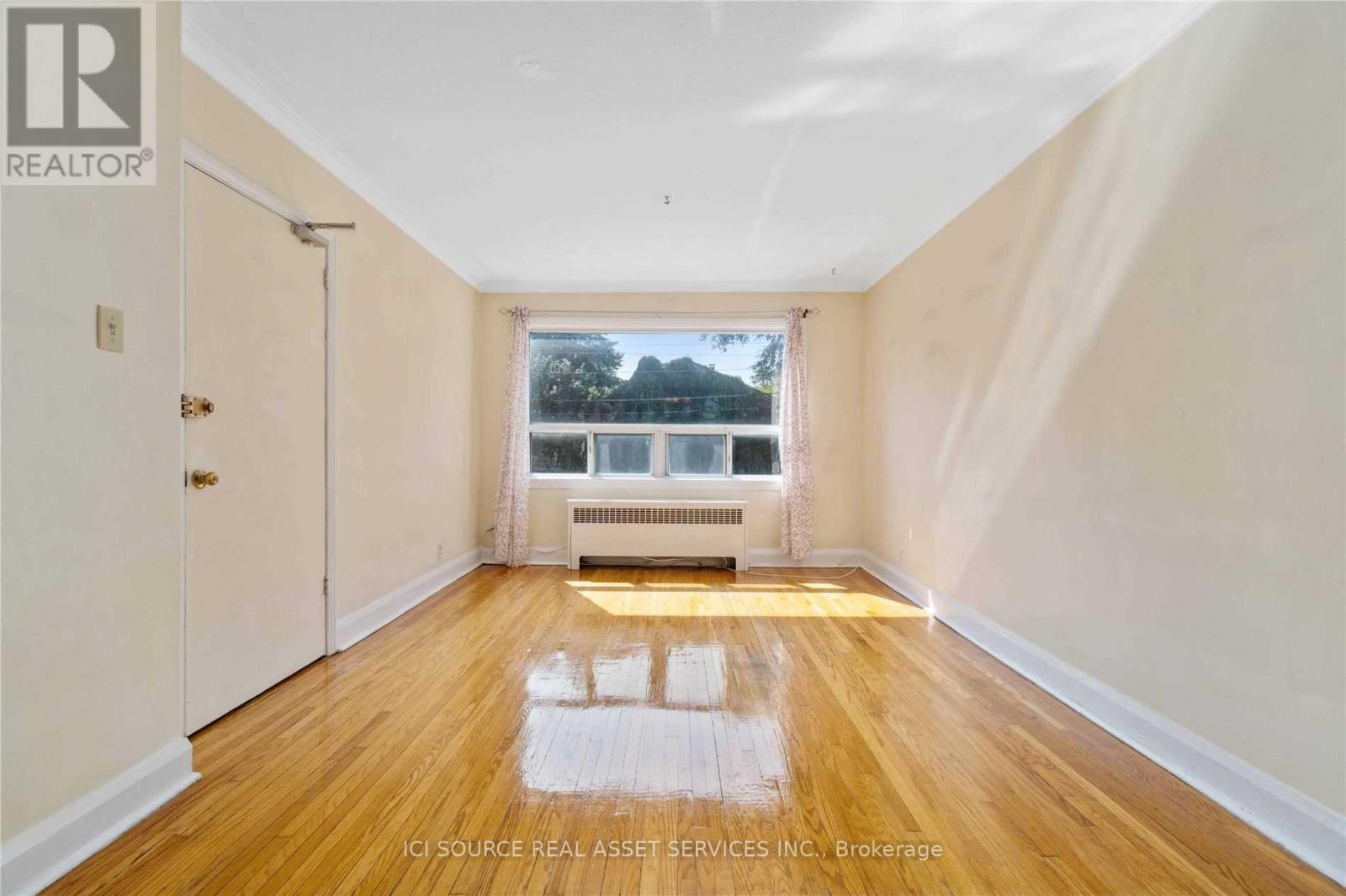 2 - 116 Eastwood Road, Toronto, Ontario  M4L 2C9 - Photo 3 - E12485038