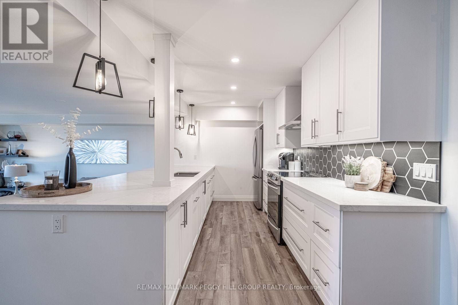 504 - 181 Collier Street, Barrie, Ontario  L4M 5L6 - Photo 6 - S12463041