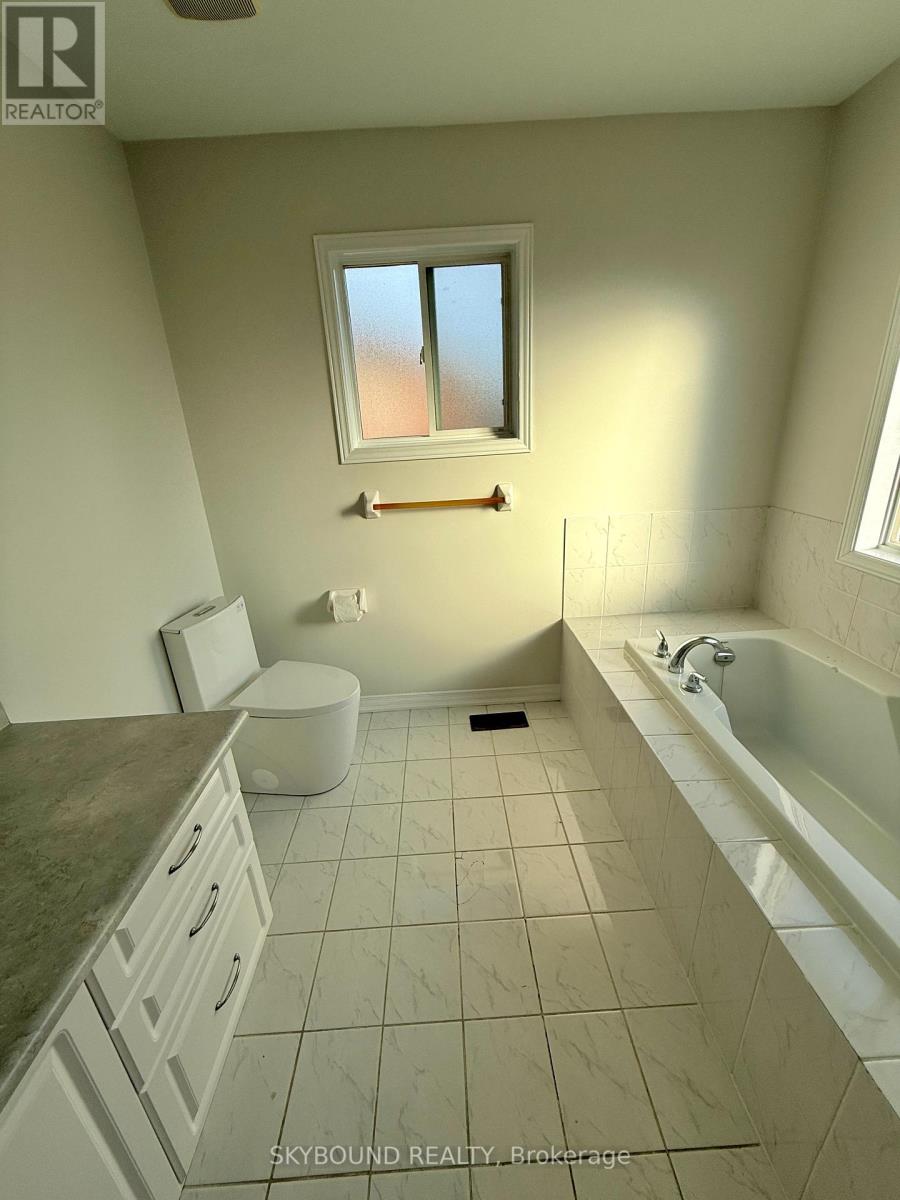 12 Sled Dog Road, Brampton, Ontario  L6R 0H8 - Photo 7 - W12454032