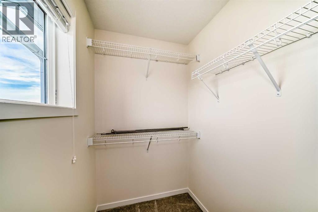 203 South Point Park Sw, Airdrie, Alberta  T4B 5G8 - Photo 26 - A2264535