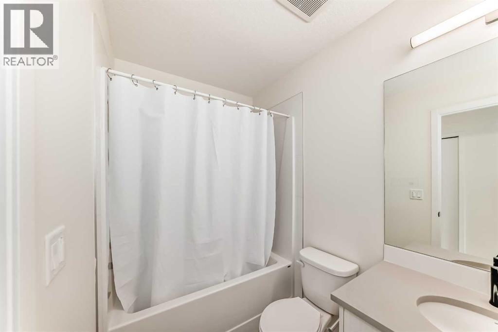 203 South Point Park Sw, Airdrie, Alberta  T4B 5G8 - Photo 32 - A2264535