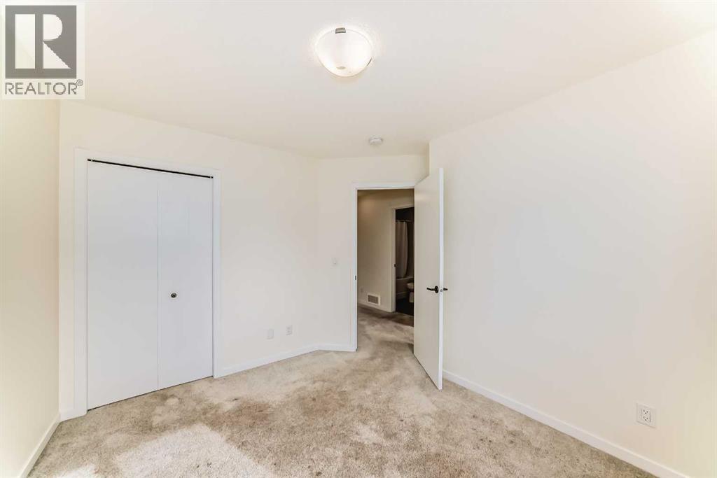 203 South Point Park Sw, Airdrie, Alberta  T4B 5G8 - Photo 31 - A2264535