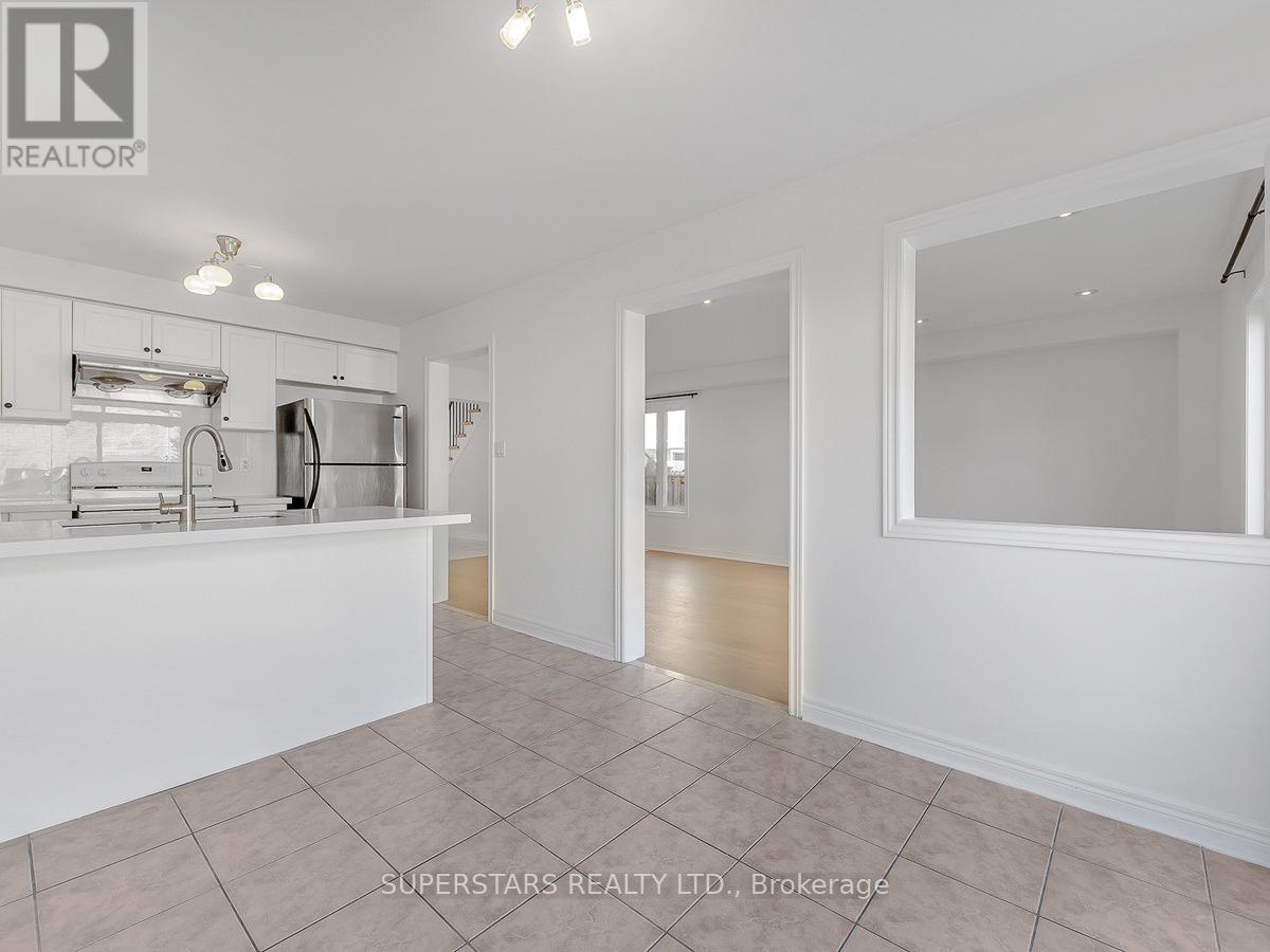 43 Cathmar Drive, Markham, Ontario  L6E 2H2 - Photo 6 - N12485103