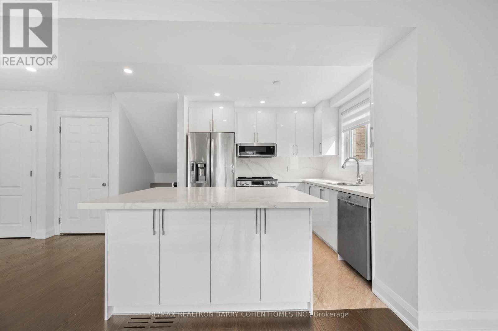 Basement & Back Main Lvl. - 194 Romfield Circuit, Markham, Ontario  L3T 3J1 - Photo 4 - N12485254