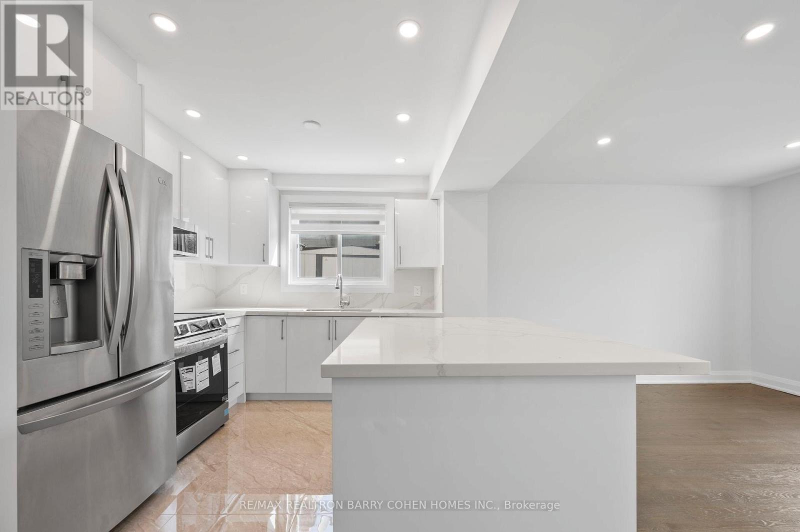 Basement & Back Main Lvl. - 194 Romfield Circuit, Markham, Ontario  L3T 3J1 - Photo 5 - N12485254