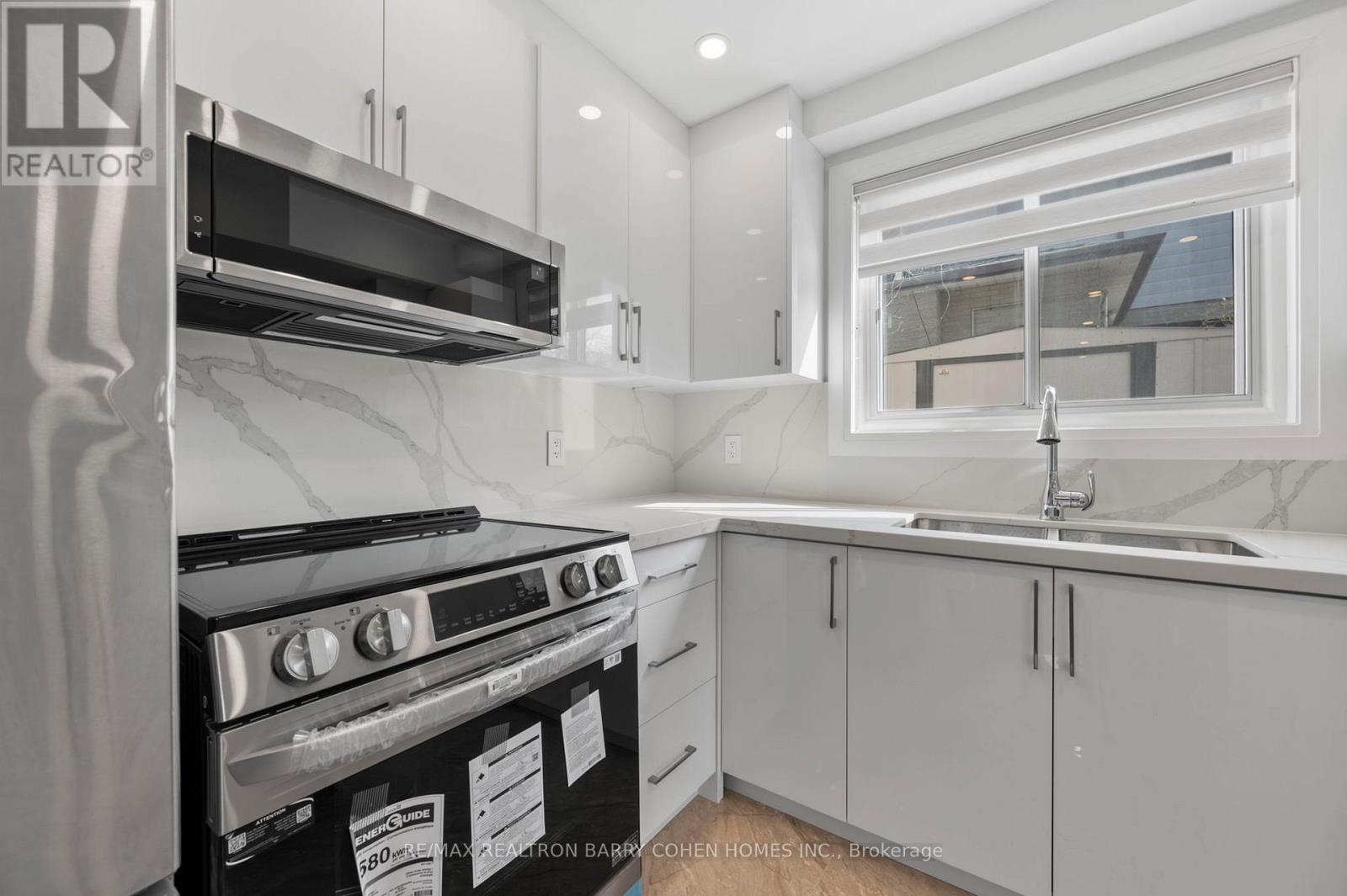 Basement & Back Main Lvl. - 194 Romfield Circuit, Markham, Ontario  L3T 3J1 - Photo 6 - N12485254