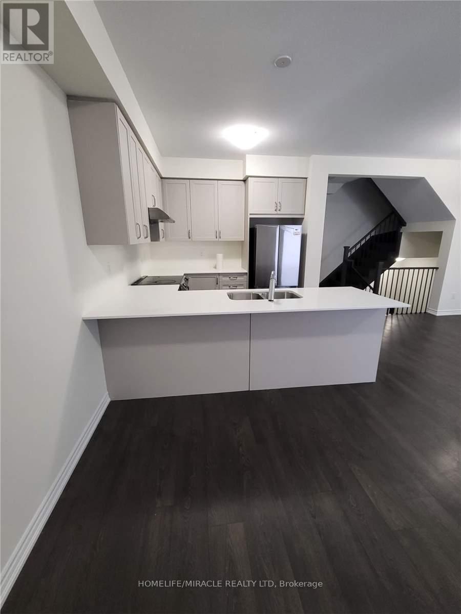 21 Purple Sage Drive, Brampton, Ontario  L6P 4N9 - Photo 9 - W12485282