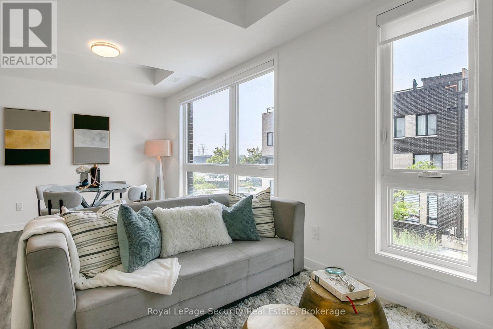 Th 22 - 40 Ed Clark Gardens, Toronto, Ontario  M6N 0B5 - Photo 13 - W12485286