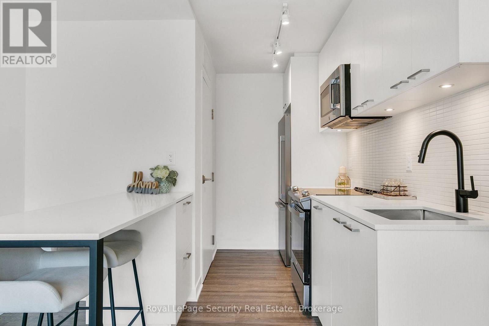 Th 22 - 40 Ed Clark Gardens, Toronto, Ontario  M6N 0B5 - Photo 19 - W12485286