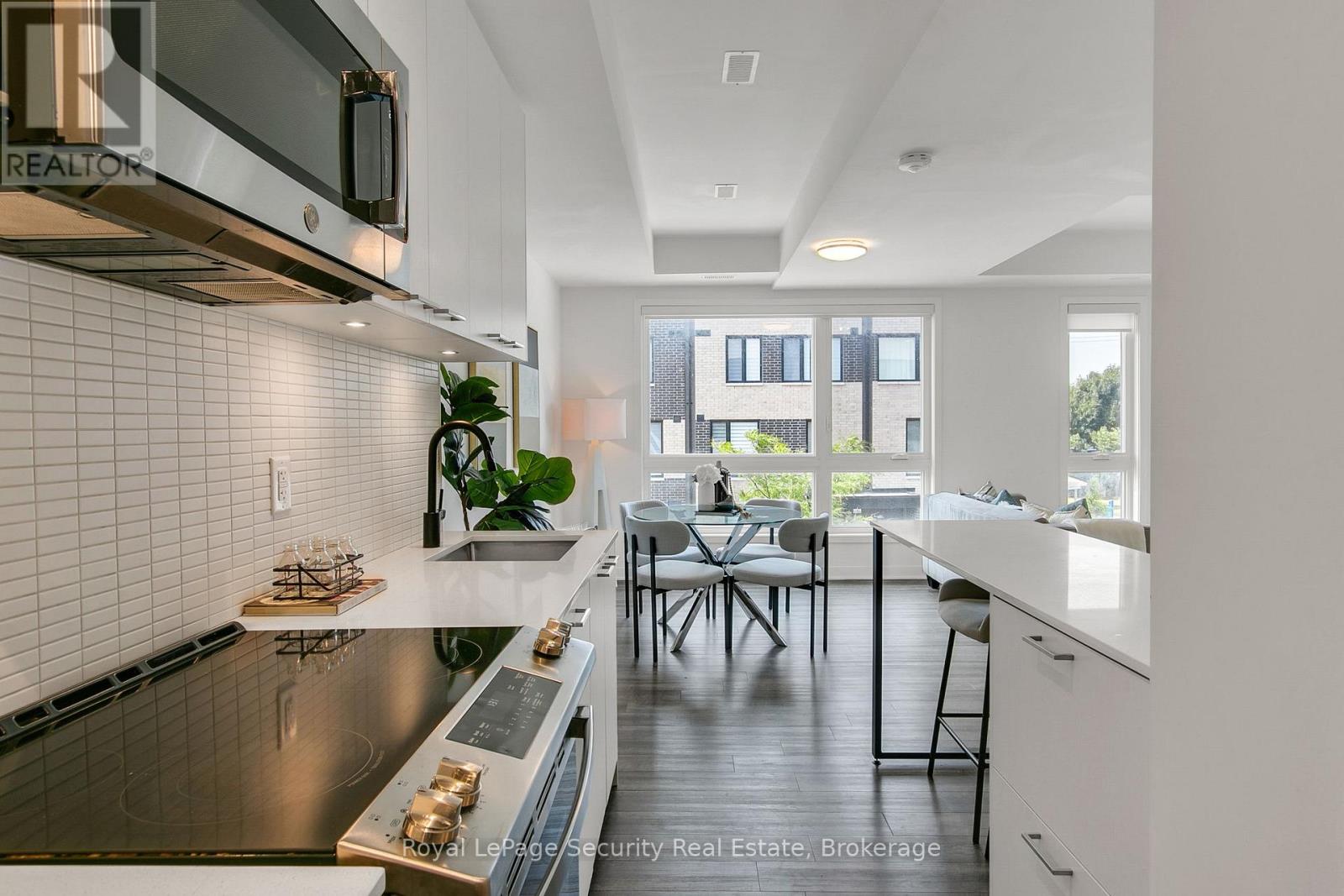 Th 22 - 40 Ed Clark Gardens, Toronto, Ontario  M6N 0B5 - Photo 21 - W12485286